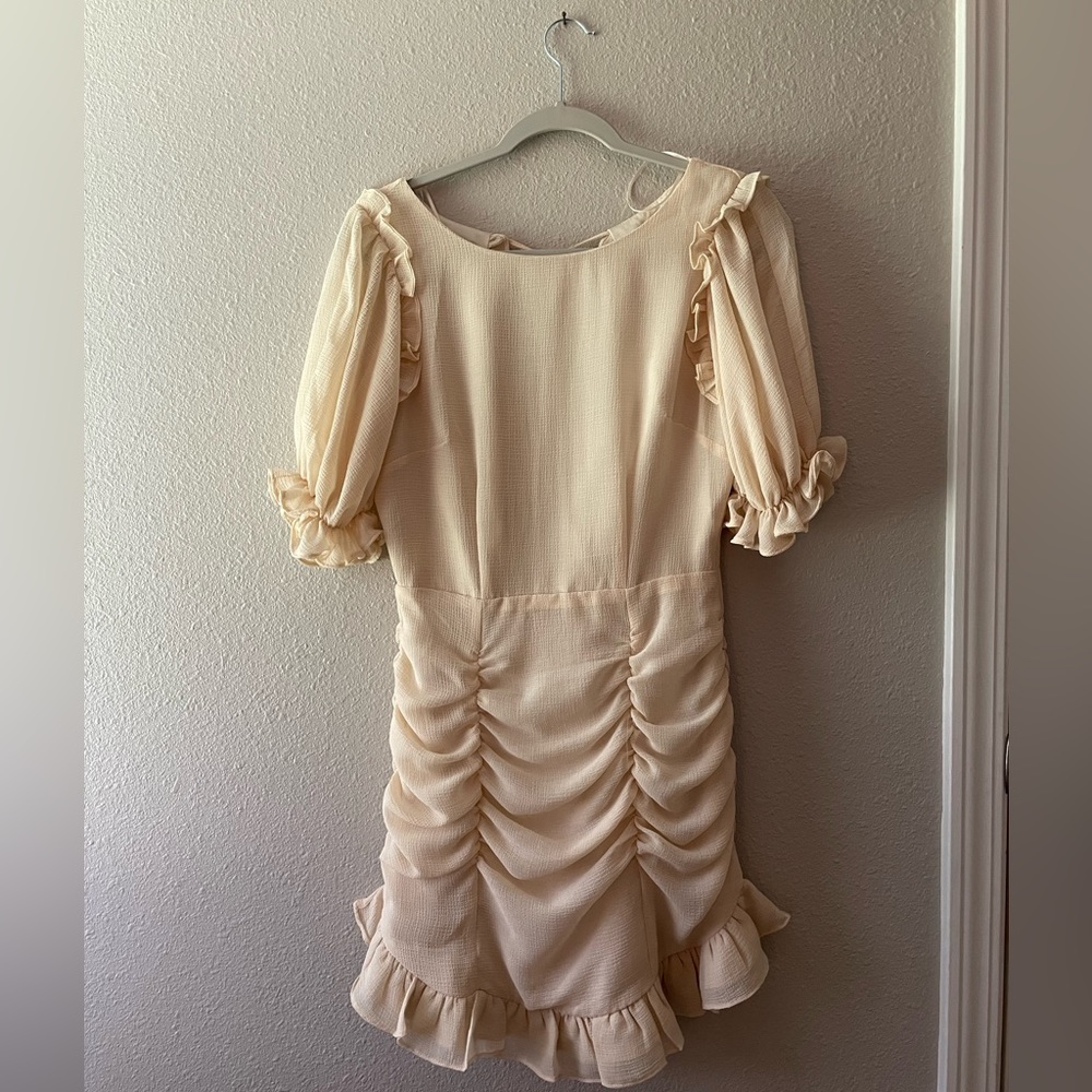 boutique crème colored dress